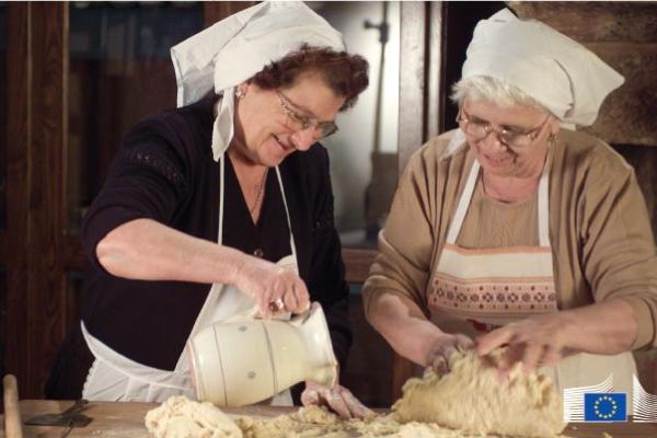 Two women making pasta